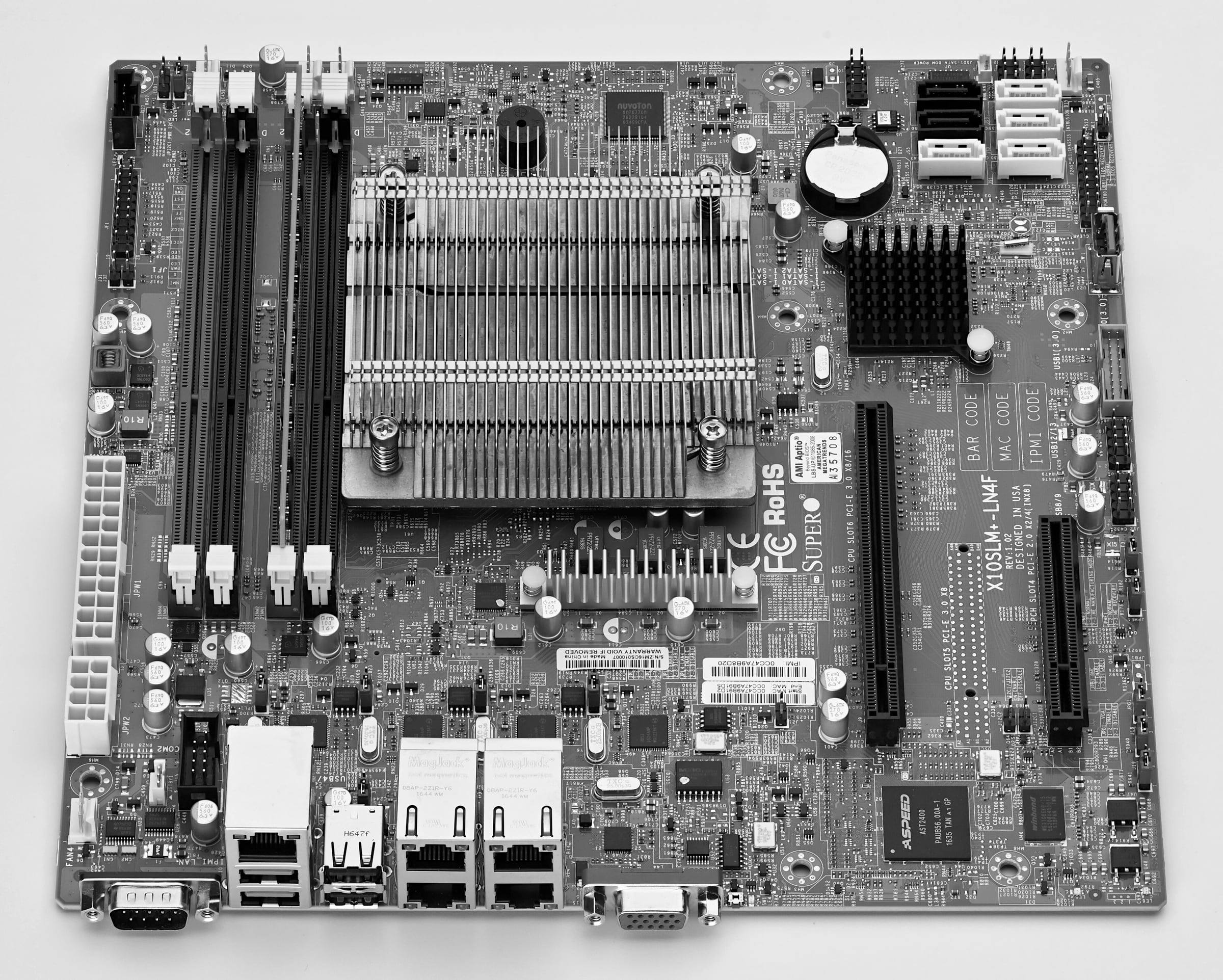 A server motherboard with CPU heatsink and memory slots